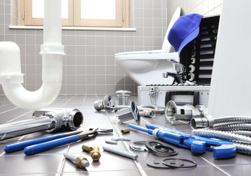 plumber tools and equipment in a bathroom, plumbing repair service, assemble and install concept